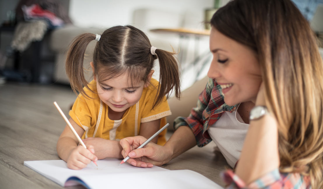 Mother and daughter in comfortable home